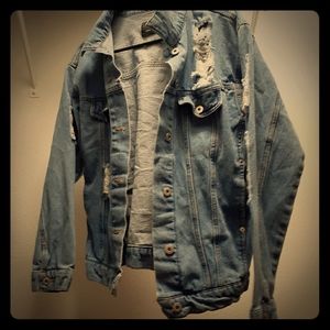 Distressed denim jacket